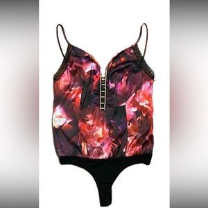 Bebe Bewilder Knit Trim Front Bodysuit